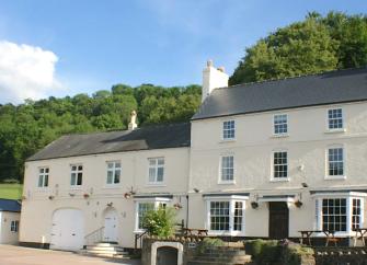 Exterior of River Wye Lodge, a Large Riverside Holiday Cottage in Herefordshire