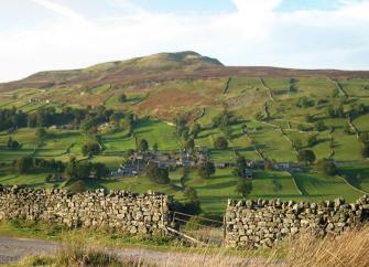 A Pennine landscape of hillside field divided by stone walls above Richmond.