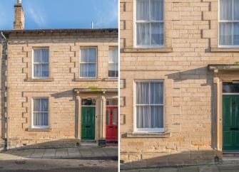 Sandstone exterior of a sandstone holiday cottage with sash windows in Alnwick
