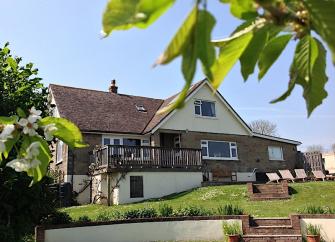 Large 3-storey contemporary holiday home with well-kept gardens.