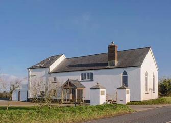 A single-storey, luxury chapel conversion in the North Devon countryside.