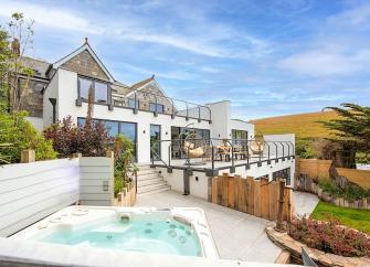 A large rural cottage with 3 terraces, gardens and a hot tub.