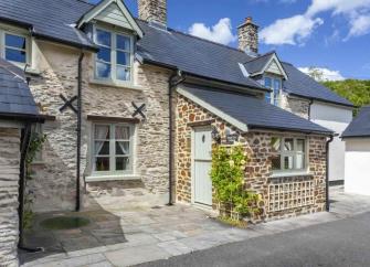 Exterior and interior of Royal Oak Cottage, a luxuriously furnished Exmoor holiday cottage in the moorland village of Withypool.