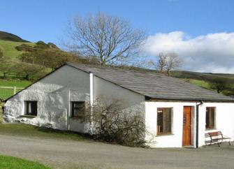 A holiday bungalow with off-road parking in a remote rural location.