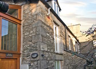 1st floor exterior o fa stone built Kendal holiday cottage.