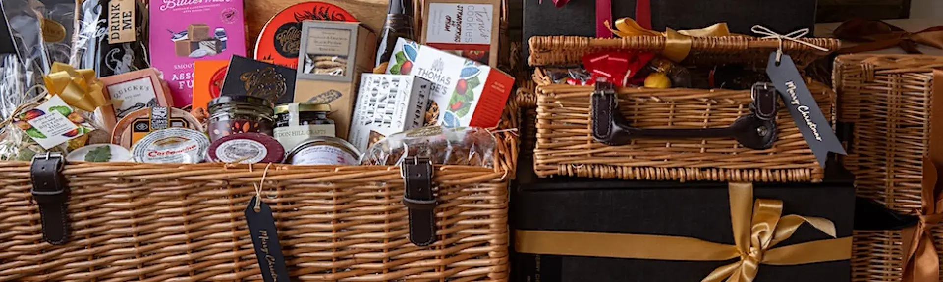 2 wicker baskets displaying packages of organic food.