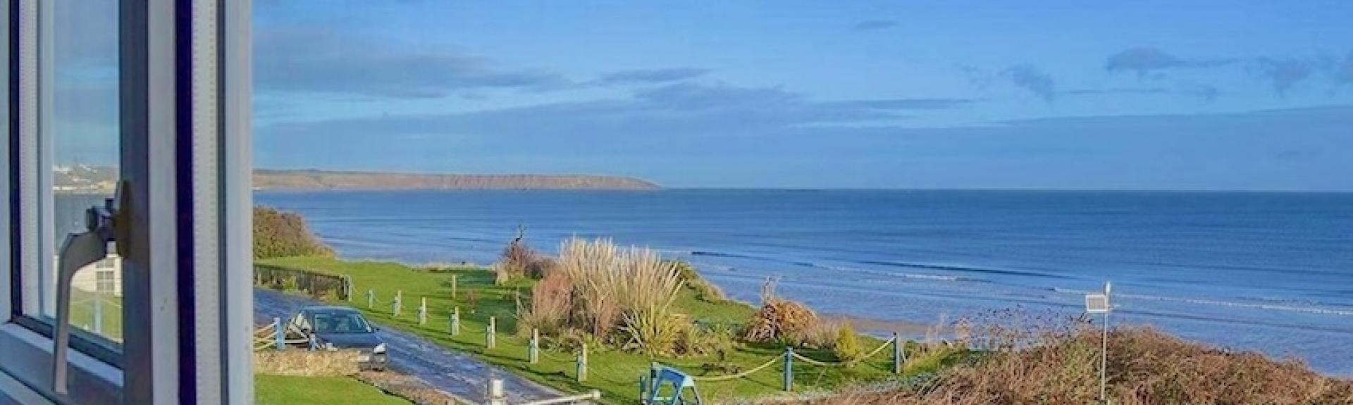 Sea views from a beach-front villa window in Filey