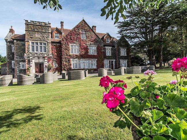 The imposing frontage of Alston Hall, an 18-bedroom South Devon Holiday Home. Sleeps38