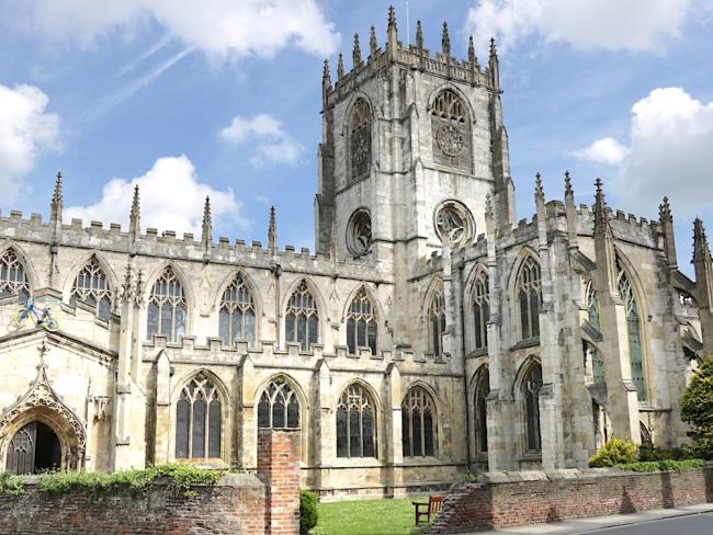 The exterior of a grand Gothic-syle cathedral in Beverley.